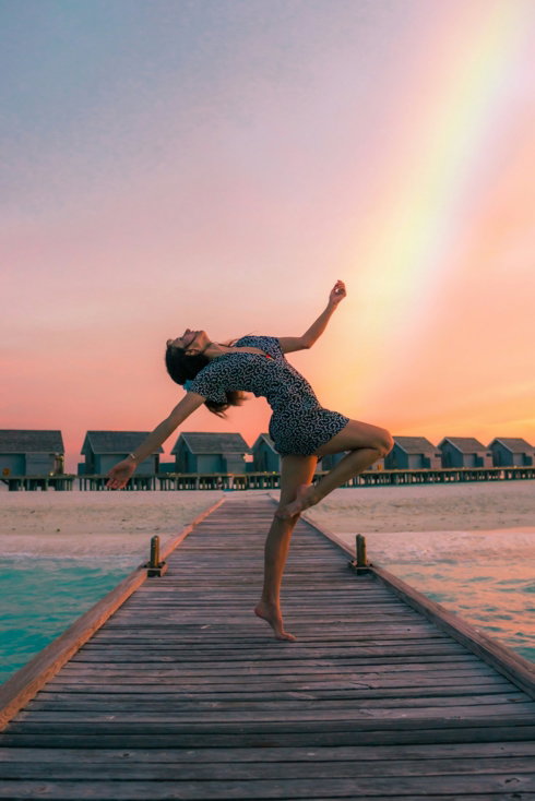 woman standing on dock